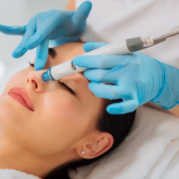 woman enjoys a massage as part of the Vie AquaFacial treatment