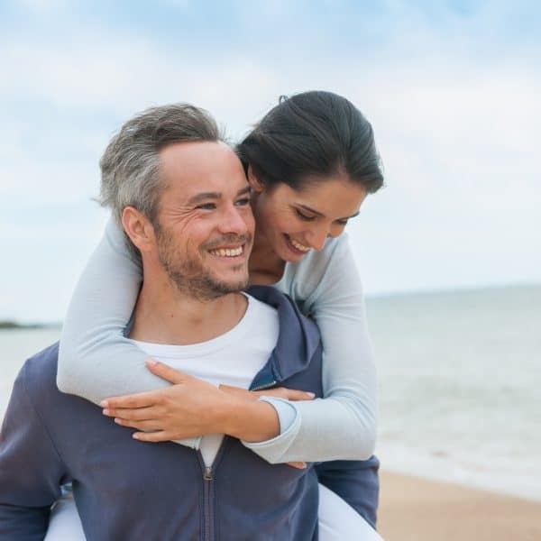 happy couple celebrate healthy living with glutathione IV shots