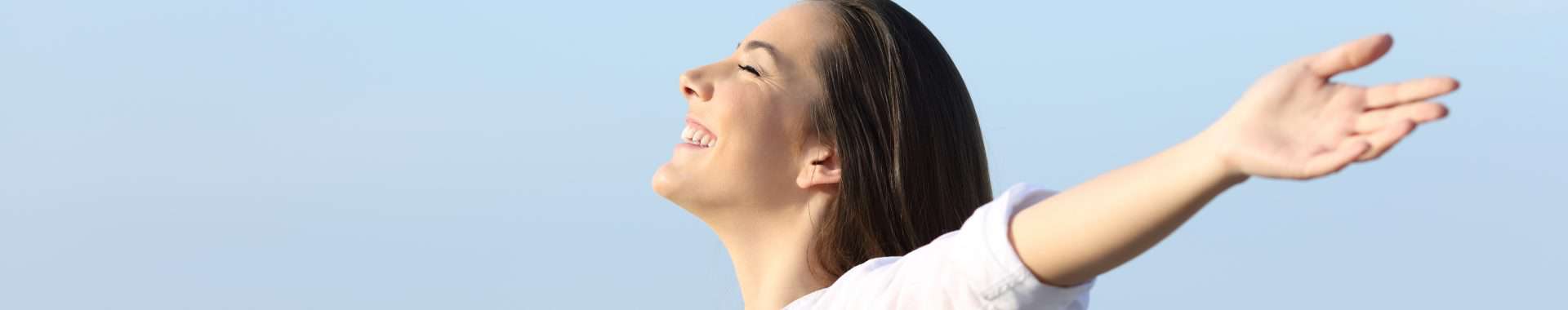 young woman celebrates a healthy lifestyle