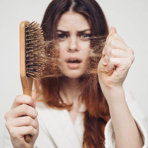 woman suffering from Telogen Effluvium hair loss