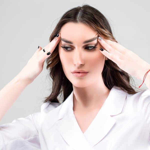 woman showing the effects of a fox eyes lift