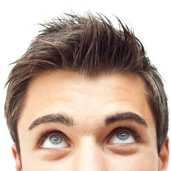 young man checking out his hair